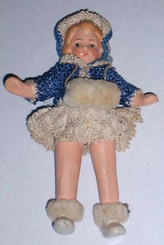 Antiques German Doll Made Of Bisque/ Porcelain.  Jointed By Wire On Arm
