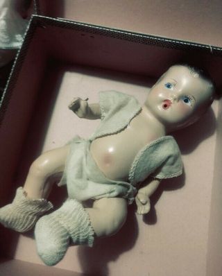 Vintage Composition Freundlich Nursing Doll,  clothes and case,  8 
