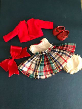 A vintage Vogue Ginny Doll Dress with a skinny Vogue Tag from 1952 3