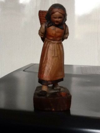 Carved Wooden Black Forest Figure Of A Woman With Kindling Basket 10 Cm.