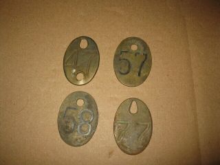 4 VINTAGE ANTIQUE BRASS COW CATTLE TAGS DISPLAY 47 57 58 77 4 2