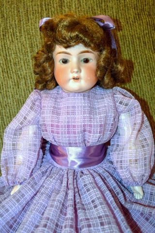 21” Antique Germany Girl Doll With 2 Outifts,  Porcelain Head & Leather Body