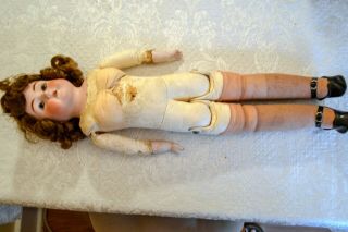 21” ANTIQUE GERMANY GIRL DOLL WITH 2 OUTIFTS,  PORCELAIN HEAD & LEATHER BODY 4
