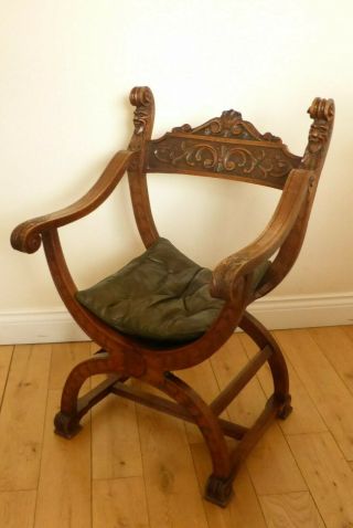 Rare & Wonderful Carved Antique Chair With Carved Faces & Leather Padded Seat