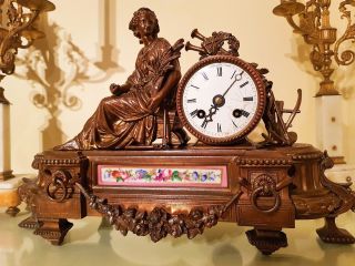 Antique French Bronzed Metal Figural Mantel Clock With Sevres Panel.