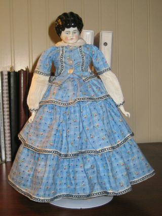 German Antique China Turned Head Doll Circa 1870 