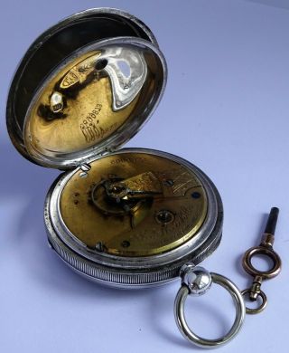 Antique Waltham heavy solid sterling silver pocket watch & key.  Running.  116.  2g 2