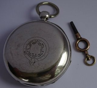 Antique Waltham heavy solid sterling silver pocket watch & key.  Running.  116.  2g 3
