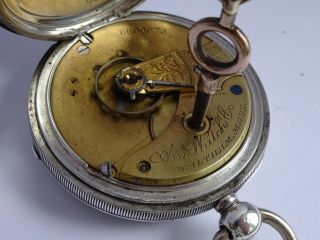 Antique Waltham heavy solid sterling silver pocket watch & key.  Running.  116.  2g 4