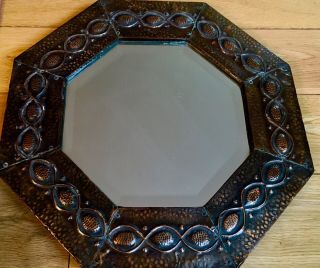An Arts & Crafts Antique Copper Based Octagonal Wall Mirror