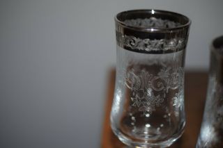 A FINE ANTIQUE SILVER RIMMED SHOT GLASSES 2