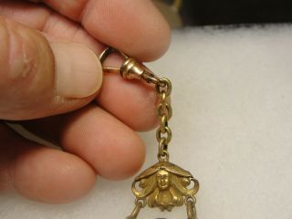 INTRESTING ANTIQUE BRASS WATCH FOB with ANGELS 3