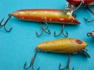 4 VINTAGE CLASSIC HEDDON WOOD GLASS EYES LURES - WELL FISHED 2