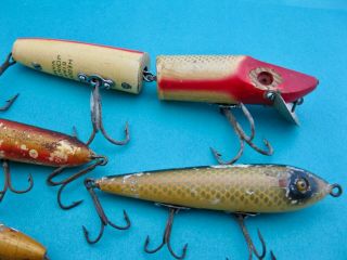 4 VINTAGE CLASSIC HEDDON WOOD GLASS EYES LURES - WELL FISHED 5