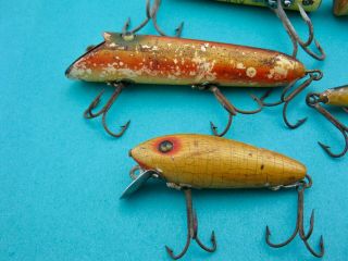4 VINTAGE CLASSIC HEDDON WOOD GLASS EYES LURES - WELL FISHED 6