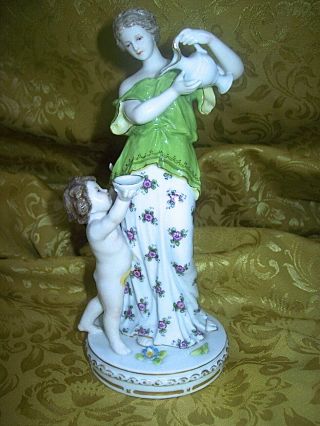 Antique German Porcelain Figurine Of Lady Pouring Drink For Cherub - Karl Ens