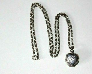 Vintage / Antique Unusual Silver Locket For 4 Photographs.  Sturdy Silver Chain.