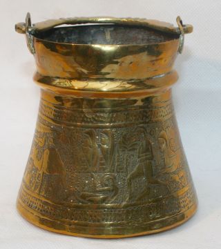 Antique Eastern Brass Milk Carrier With Hammered Design Of Men,  Sphinx & Camels