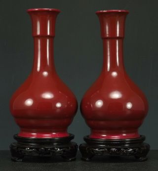 Antique Chinese Ceramic Porcelain Vase Pair Dark Red 9 " Tall Wood Stands