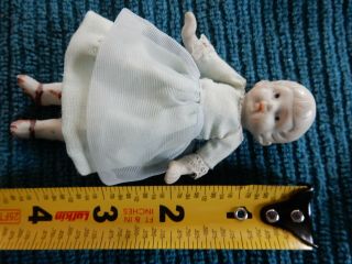 Antique 4 Inch Bisque Doll With Dress Made In Japan