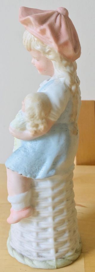 antique HEUBACH porcelain GIRL figure figurine with TOY DOLL 3