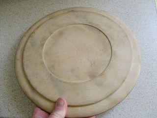 An Antique Carved Wooden Bread Board 