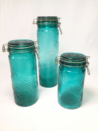 Set Of 3 Vintage Antique Teal Glass Canisters,  Fruit Embossed,  Wire Bail Lids