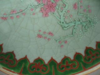 A large Oriental porcelain bowl,  crackled celadon glaze,  overglaze enamels. 3