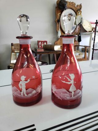11.  5 " Cranberry Glass Hand Painted Mary Gregory Decanters Boy & Girl
