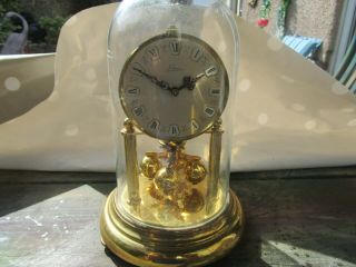 Brass Mantel Clock With A Glass Dome By Kein.  No Key
