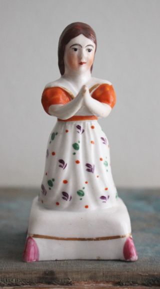 An Early C19th Antique Square Cushion Base Staffordshire Figure,  Girl In Prayer