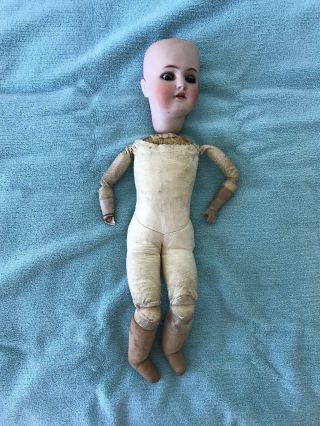 Antique Leather Body Doll With Porcelain Head & Hands Made In Germany.