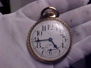 16s,  15j,  Open Face,  Elgin Pocket Watch,  Model 575 In 10k Rolled Gold Plate