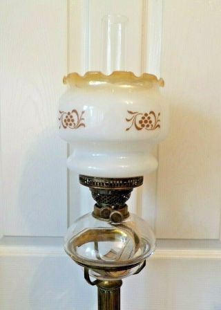 A stunning heavy Victorian brass column oil lamp glass drop in font twin burner 3