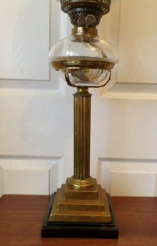 A stunning heavy Victorian brass column oil lamp glass drop in font twin burner 5