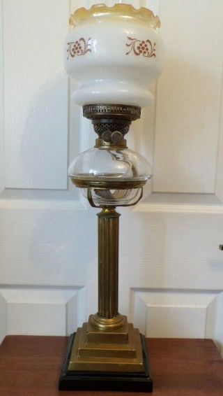 A stunning heavy Victorian brass column oil lamp glass drop in font twin burner 6
