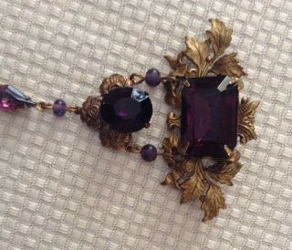 Gorgeous antique/vintage amethyst stones set in soldered brass to make a brooch. 7