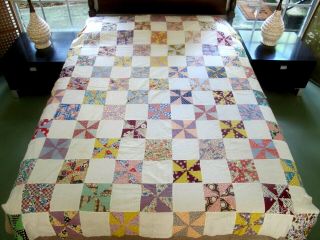 Vintage Hand Pieced Feed Sack,  Some Novelty Prints Pinwheel Quilt Top; 81 " X 63 "