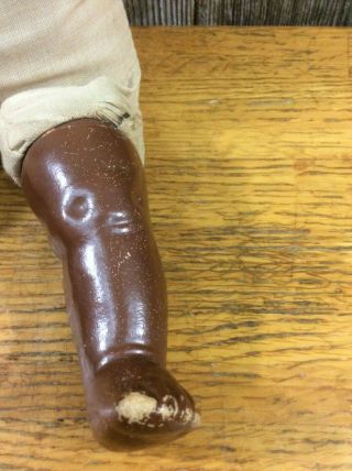 Antique pressed metal doll African American stuffed body 3