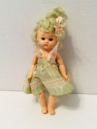 Vintage 8 " Sleepy Eyed Hard Plastic Doll (head,  Arm & Legs Move) Green Dress