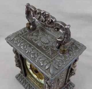 ANTIQUE SMALL ANSONIA CARRIAGE CLOCK WITH VERY ORNATE CASE - 7