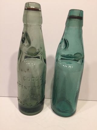 2 Antique Codd Neck Bottles Glass Marble Green (ex Strong Glass) & Blue (bombay)