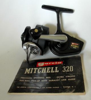 Vintage Garcia Mitchell 320 Spinning Reel & Book - -