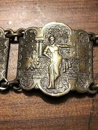 KISS OF THE KING DJINN.  antique bracelet with various images. 4