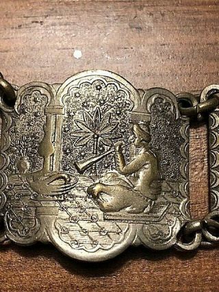 KISS OF THE KING DJINN.  antique bracelet with various images. 5