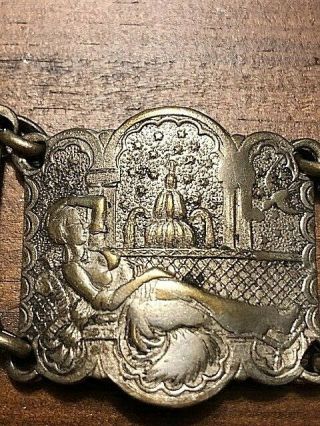 KISS OF THE KING DJINN.  antique bracelet with various images. 6