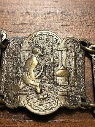 KISS OF THE KING DJINN.  antique bracelet with various images. 7