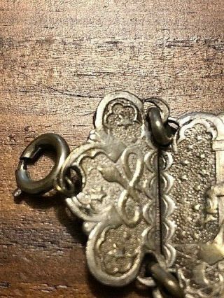 KISS OF THE KING DJINN.  antique bracelet with various images. 8
