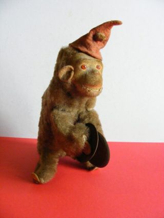 Early Schuco Early Vintage Mechanical Monkey Playing Symbols,  Red Eyes,  C1920s