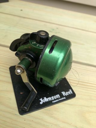 Johnson Century Fishing Reel,  Display Stand And Parts List.  Exceptional